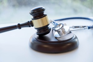 gavel-and-stethoscope-medical-jurisprudence-legal-definition-of-picture-id926152600