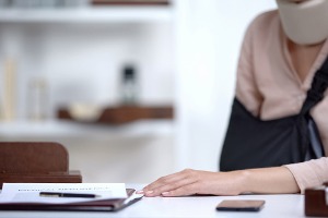 A person with multiple injuries, waiting to talk with an Injury Attorney in Pekin IL