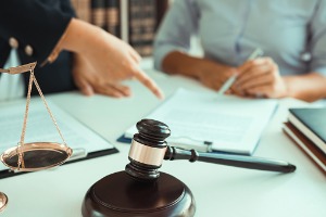An attorney assisting a client with filing for Chapter 7 Bankruptcy in Peoria IL