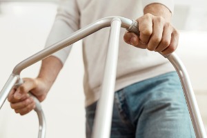 A man using a walker who needs help from a Social Security Lawyer in East Peoria IL