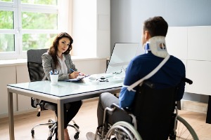 Personal Injury Law Lawyer talking with client in Peoria IL