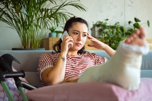 Woman on the phone talking to a Personal Injury Law Lawyer in Bloomington IL